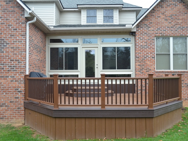 outside brick home with deck